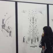 Booth installation image; visitor viewing 'Valley' by Rachel Goodyear